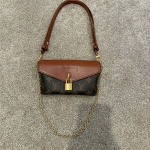 Authentic Louis Vuitton Padlock on strap